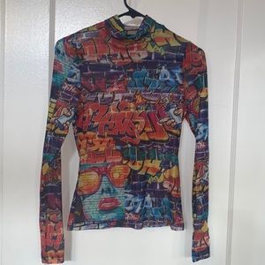Sheer, mock neck, long sleeve printed top